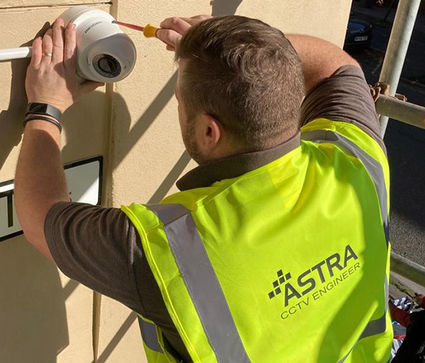Astra Security Engineer Installing CCTV Camera